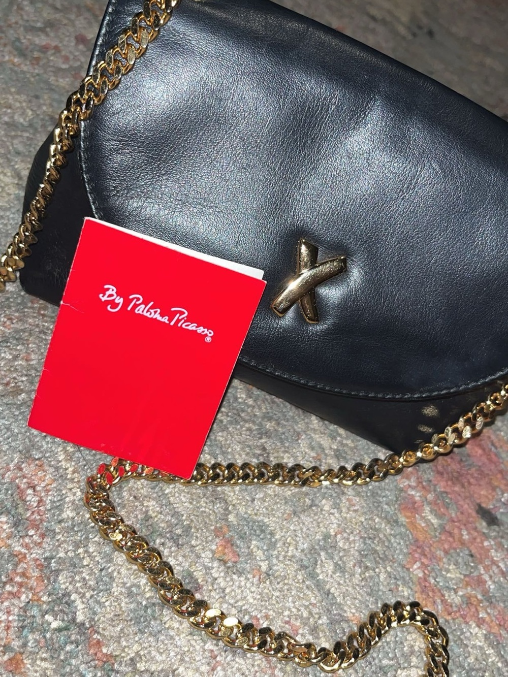 Paloma Picasso Black Leather Crossbody with Gold Chain and Logo Accent